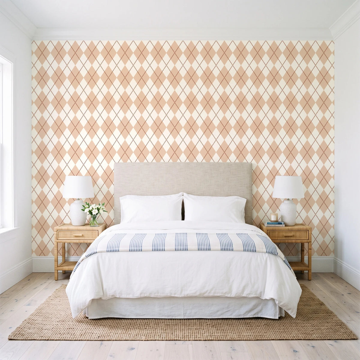 Linen Diamonds Terracotta argyle wallpaper behind a queen bed in a bright coastal bedroom