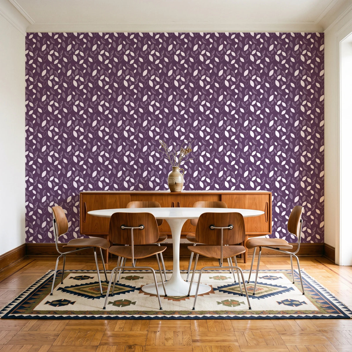 Linen & Leaf Plum leaf wallpaper in a mid-century dining room with a teak sideboard and tulip table