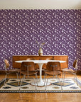 Linen & Leaf Plum leaf wallpaper in a mid-century dining room with a teak sideboard and tulip table
