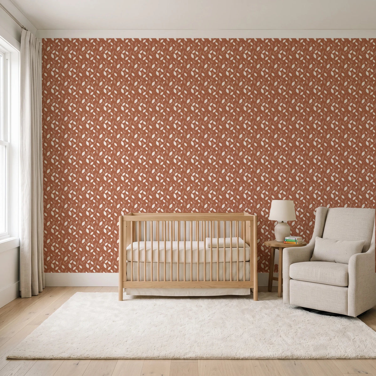 Linen & Leaf Terracotta leaf wallpaper in a calm, light-filled nursery