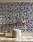 Magnolia Morning Plum magnolia bloom wallpaper on the wall of a grand entry foyer