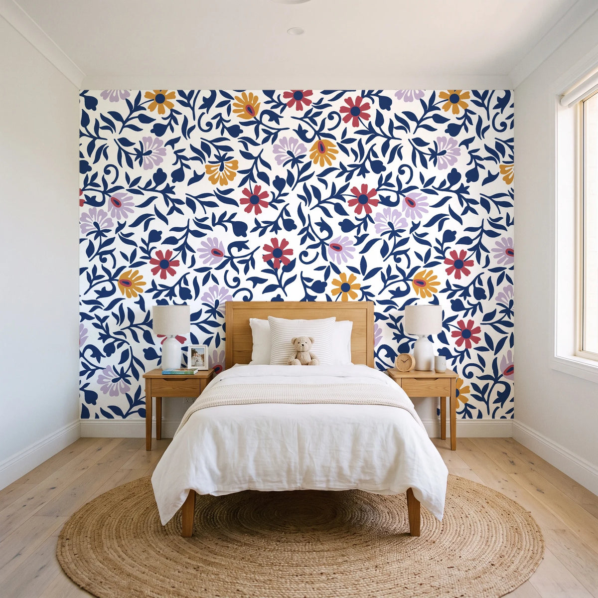 Matisse Reverie Navy folk floral wallpaper in a bright, cheerful child's bedroom