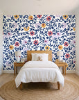 Matisse Reverie Navy folk floral wallpaper in a bright, cheerful child's bedroom