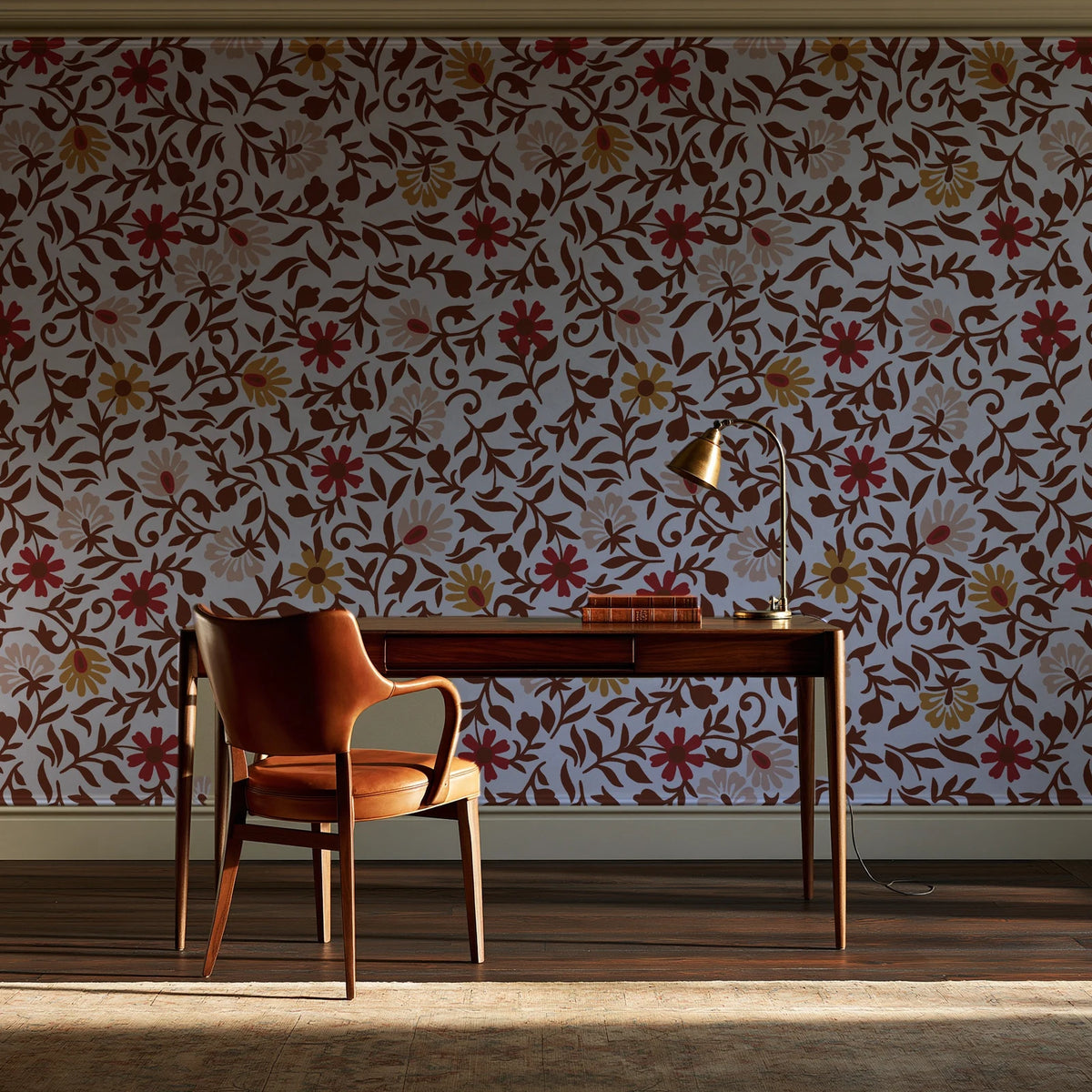 Matisse Reverie Rust folk floral wallpaper as a feature wall in a home study