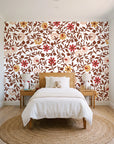 Matisse Reverie Rust folk floral wallpaper in a bright, cheerful child's bedroom