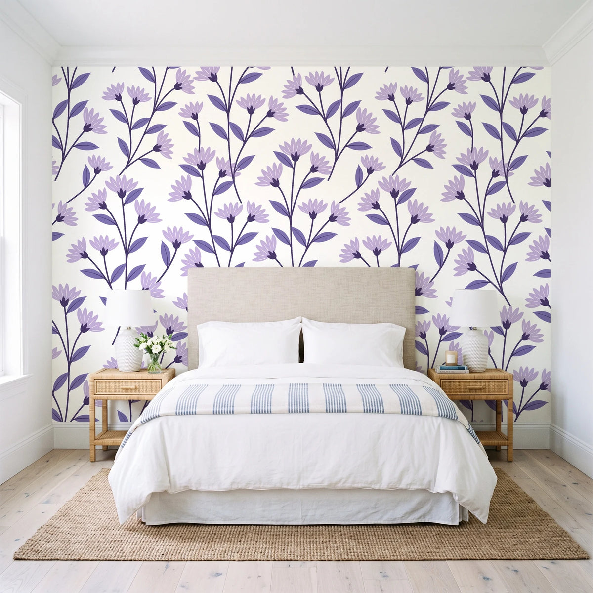 Meadow Light Lavender meadow flower wallpaper behind a queen bed in a bright coastal bedroom