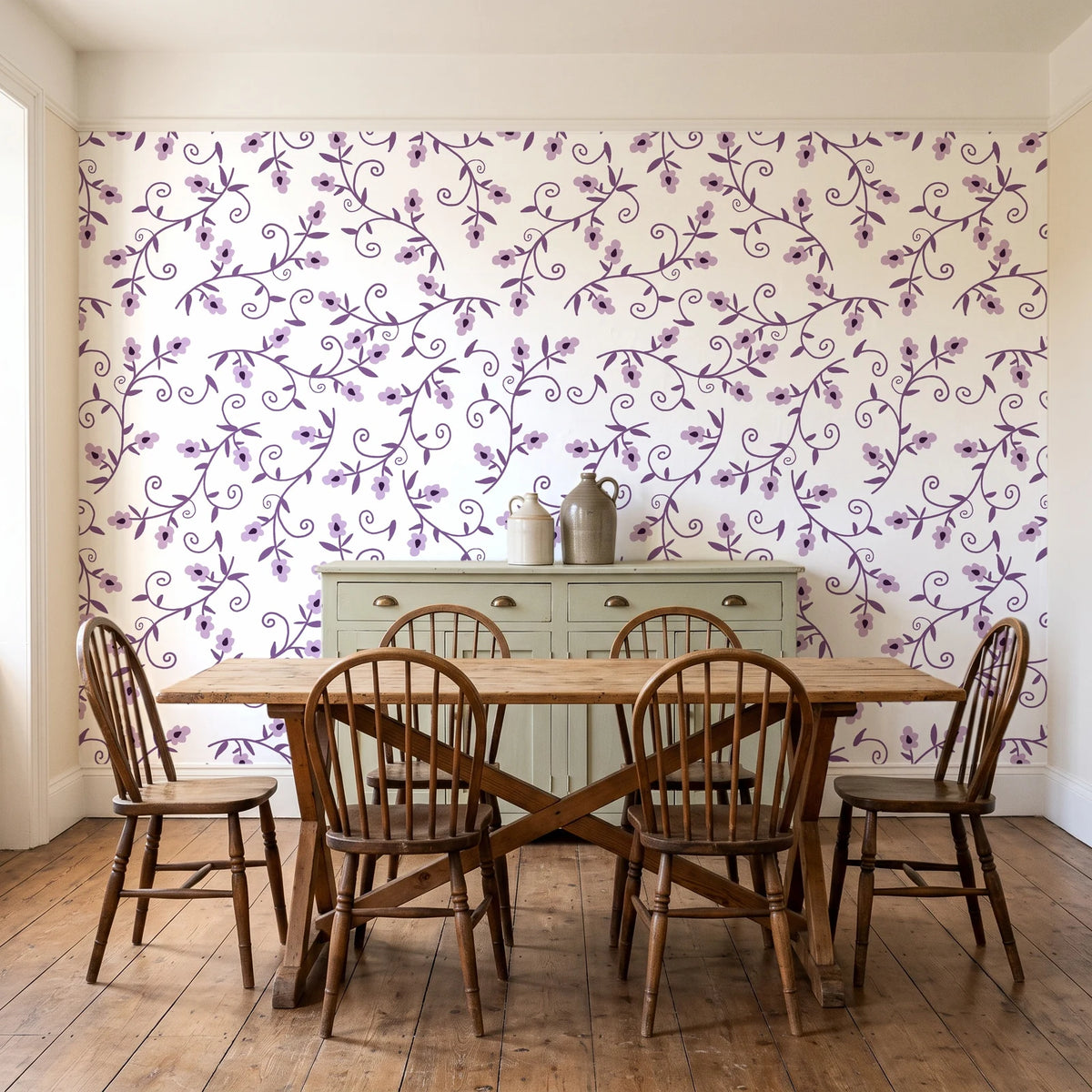 Meadow Wander Plum floral vine wallpaper in a farmhouse dining room with a sage sideboard and rustic trestle table