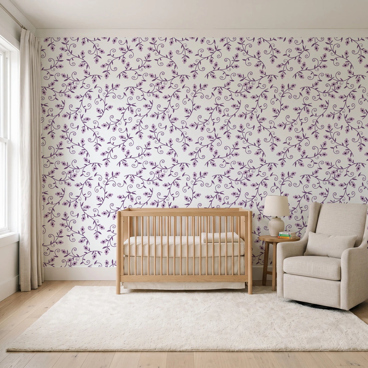 Meadow Wander Plum floral vine wallpaper in a calm, light-filled nursery