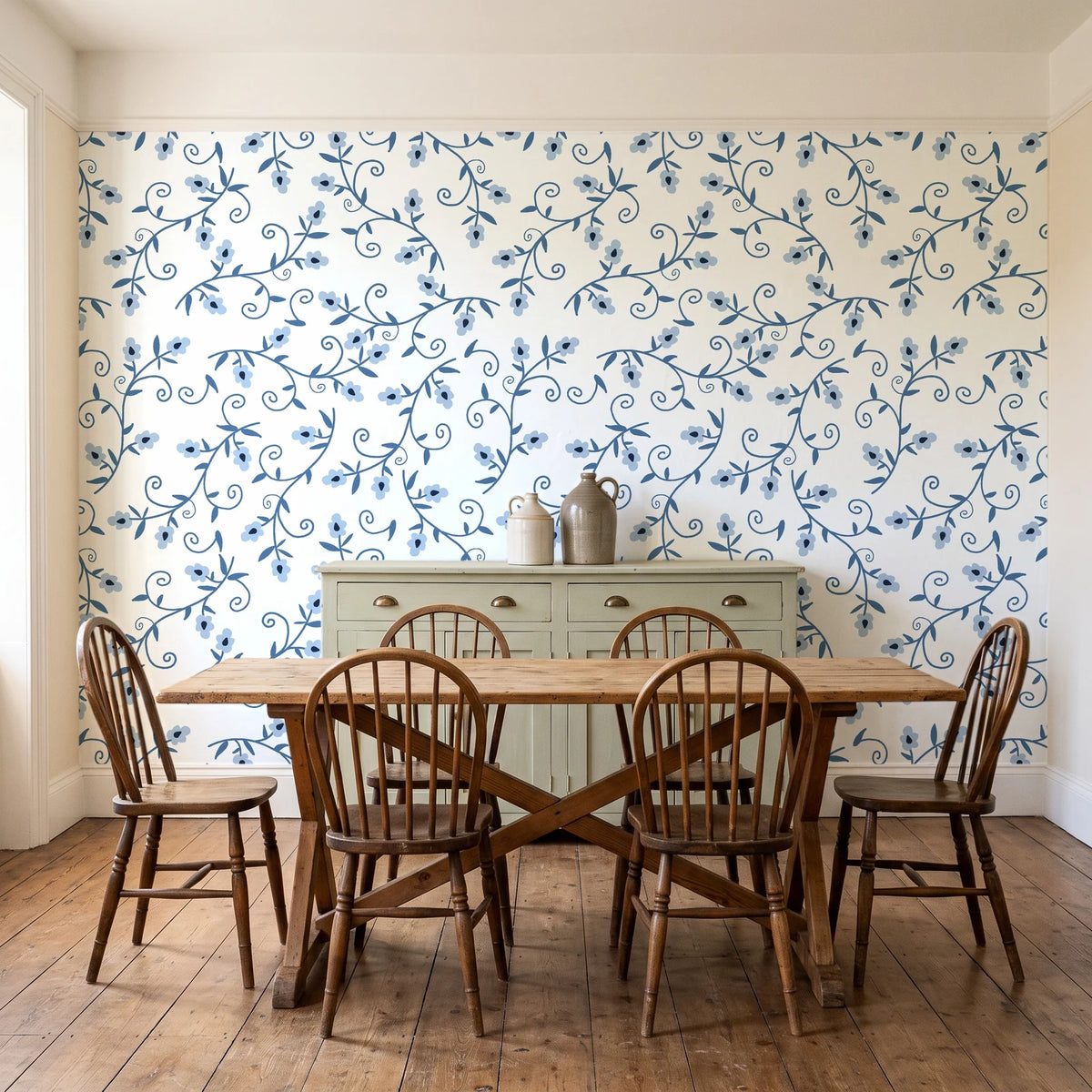 Meadow Wander Slate floral vine wallpaper in a farmhouse dining room with a sage sideboard and rustic trestle table