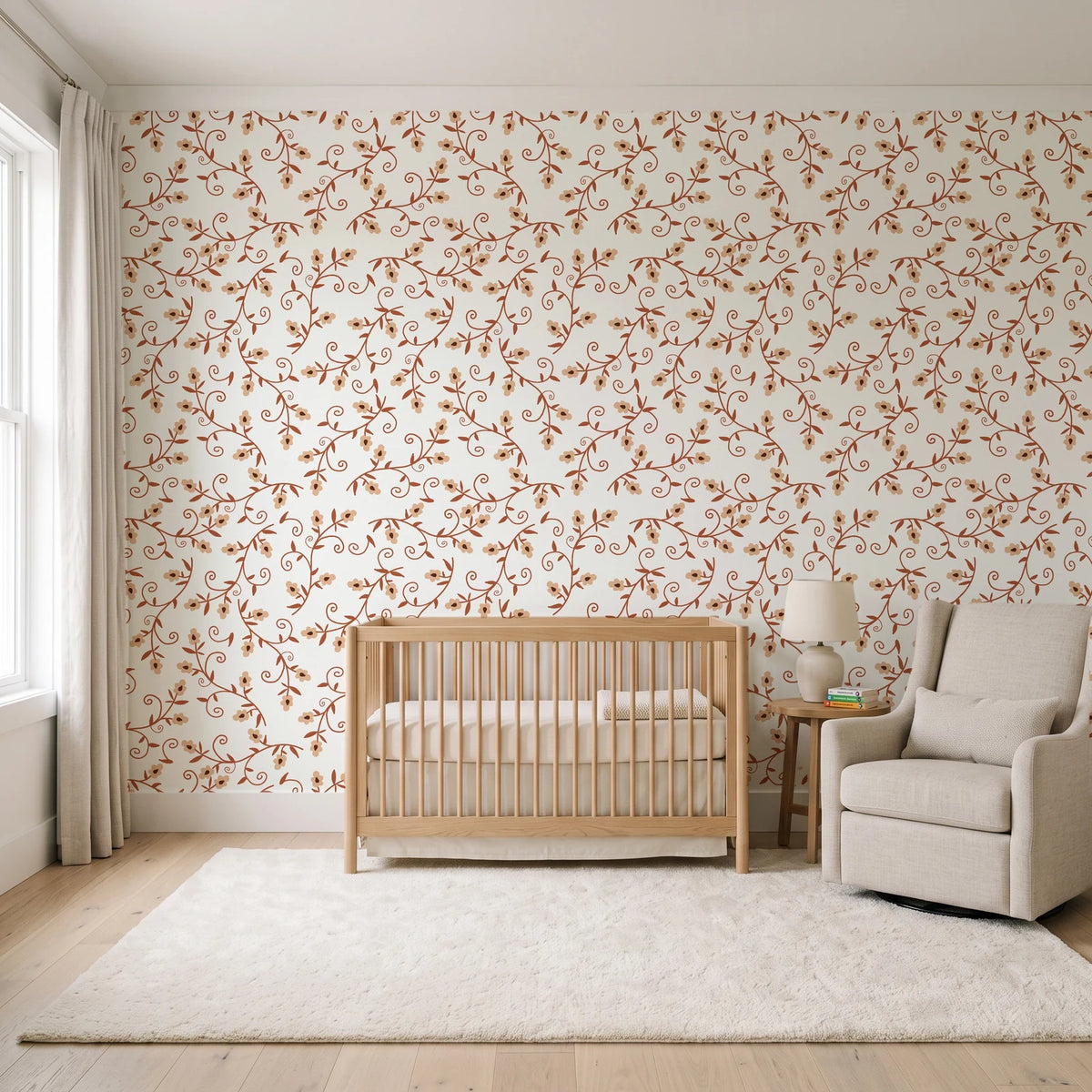 Meadow Wander Terracotta floral vine wallpaper in a calm, light-filled nursery
