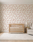 Meadow Wander Terracotta floral vine wallpaper in a calm, light-filled nursery