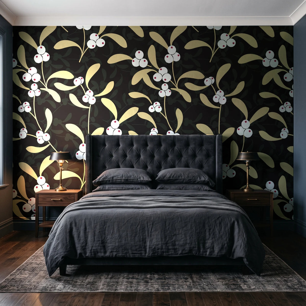 Mistletoe Trail Noir mistletoe wallpaper behind a tufted headboard in a dark, moody bedroom