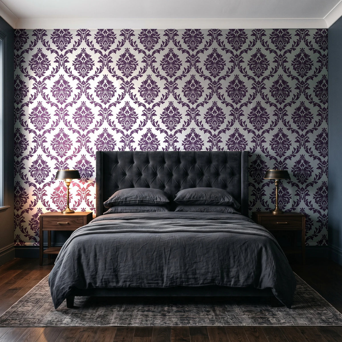 Misty Fern Romance Plum damask wallpaper behind a tufted headboard in a dark, moody bedroom