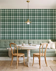 Moors & Mist Forest plaid wallpaper as a feature wall in a sunlit breakfast nook