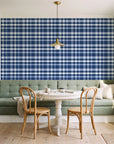 Moors & Mist Navy plaid wallpaper as a feature wall in a sunlit breakfast nook