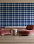Moors & Mist Navy plaid wallpaper in a boutique hotel sitting area