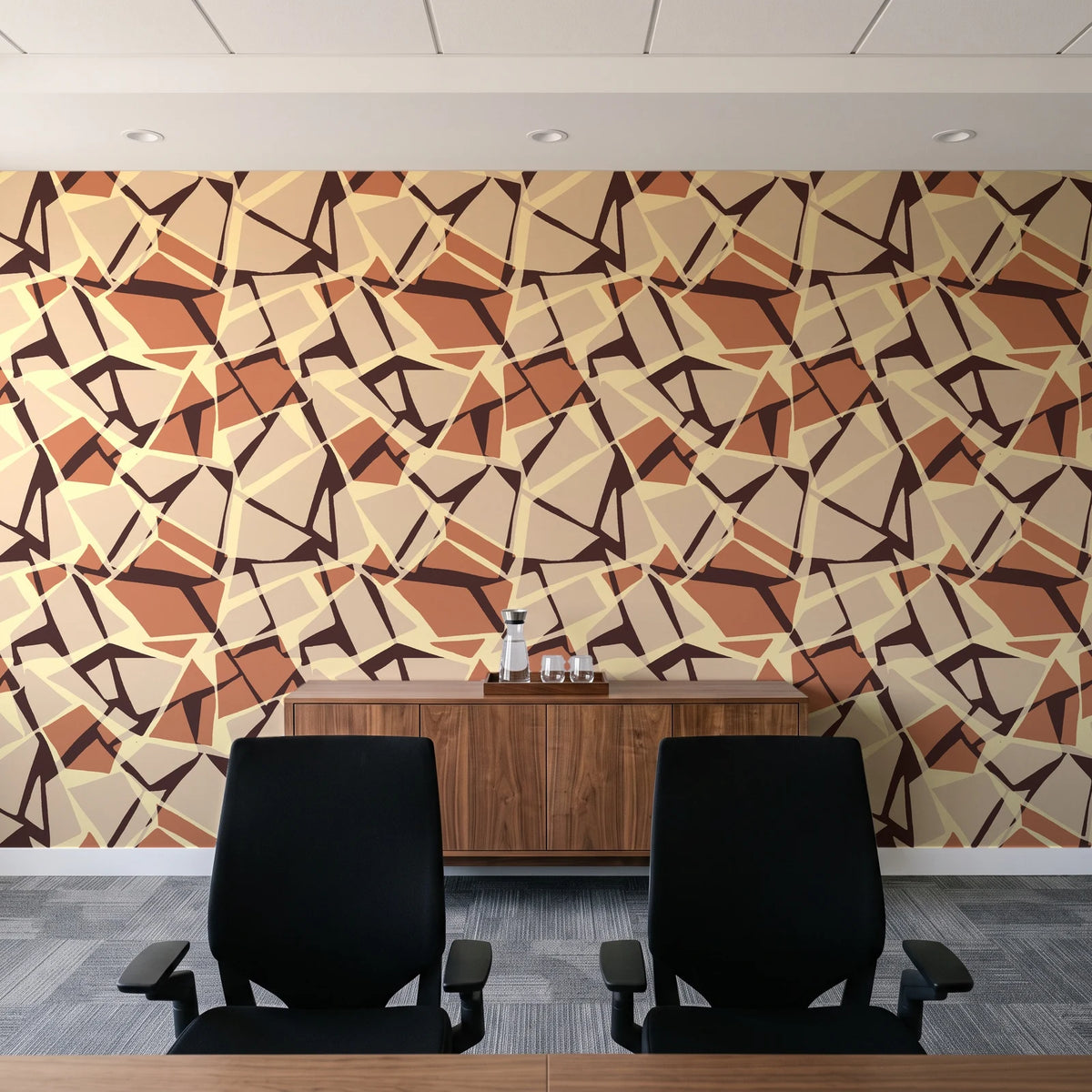 Muted Block Terracotta geometric wallpaper above a walnut credenza in a modern conference room