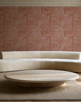 Nomad Stripe Terracotta geometric wallpaper in an elegant living room