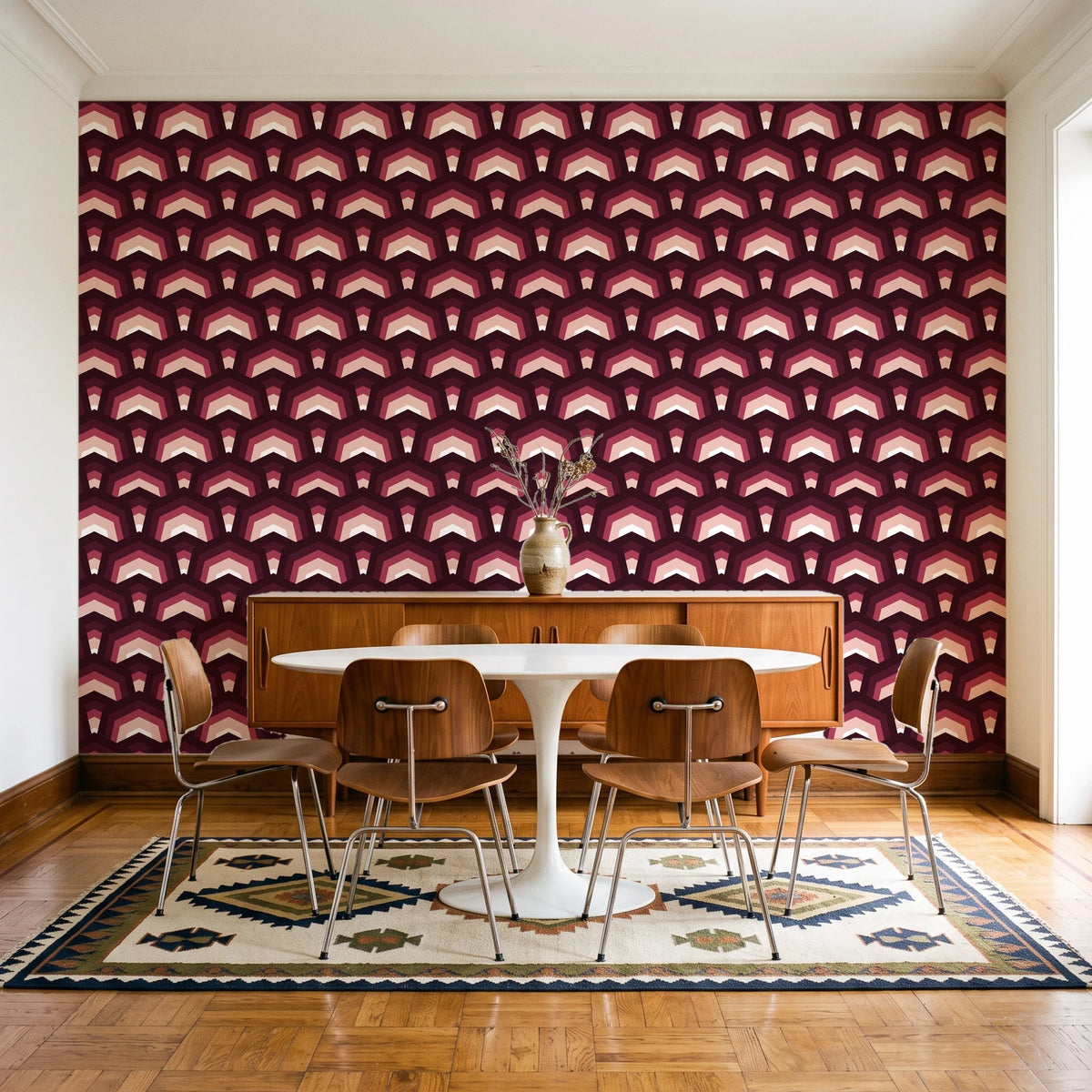 Ocean Fortress Oxblood art deco scale wallpaper in a mid-century dining room with a teak sideboard and tulip table