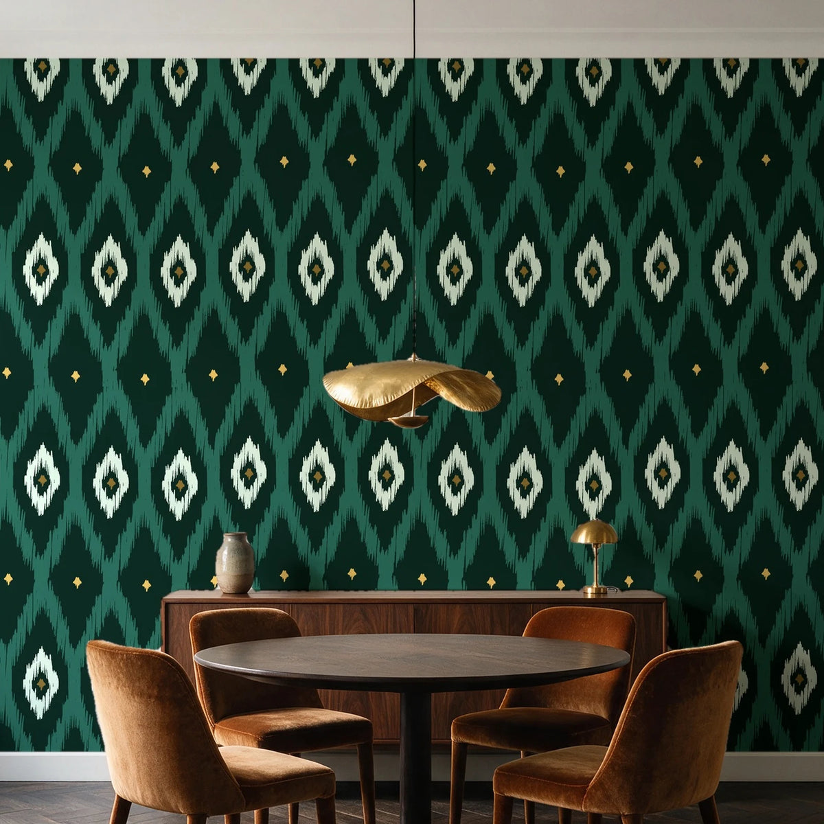Ogee Loom Emerald ikat ogee wallpaper behind a walnut credenza and round table in an elegant dining room