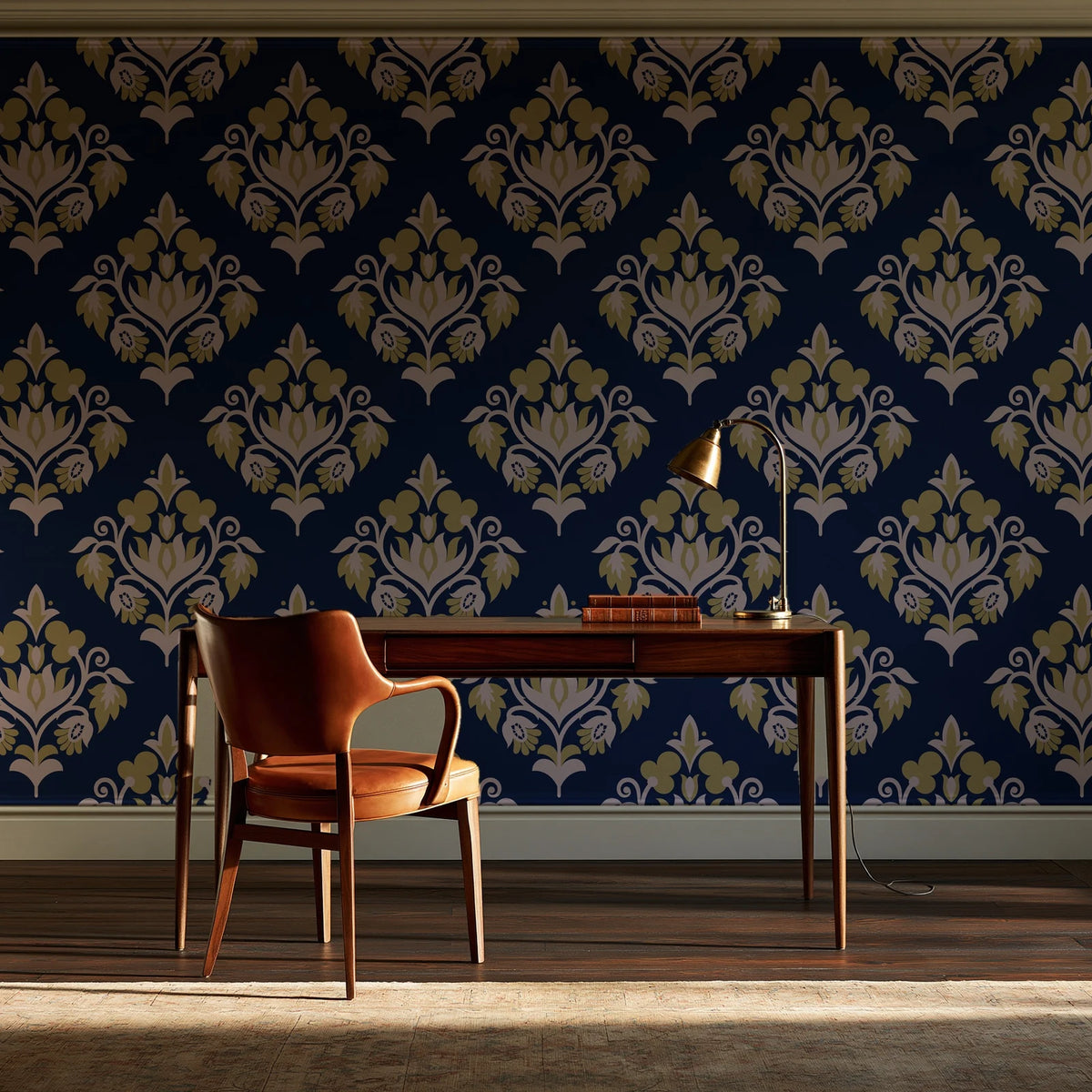 Old World Flora Navy floral damask wallpaper as a feature wall in a home study