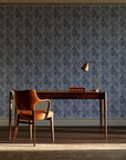 Olive Fret Charcoal geometric fret wallpaper as a feature wall in a home study