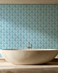 Olive Fret Teal geometric fret wallpaper creating ambiance in a serene spa bathroom