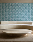 Olive Fret Teal geometric fret wallpaper in an elegant living room