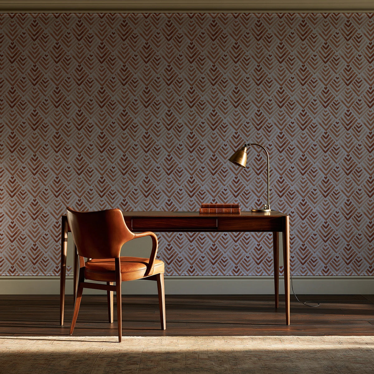 Olive Fret Terracotta geometric fret wallpaper as a feature wall in a home study