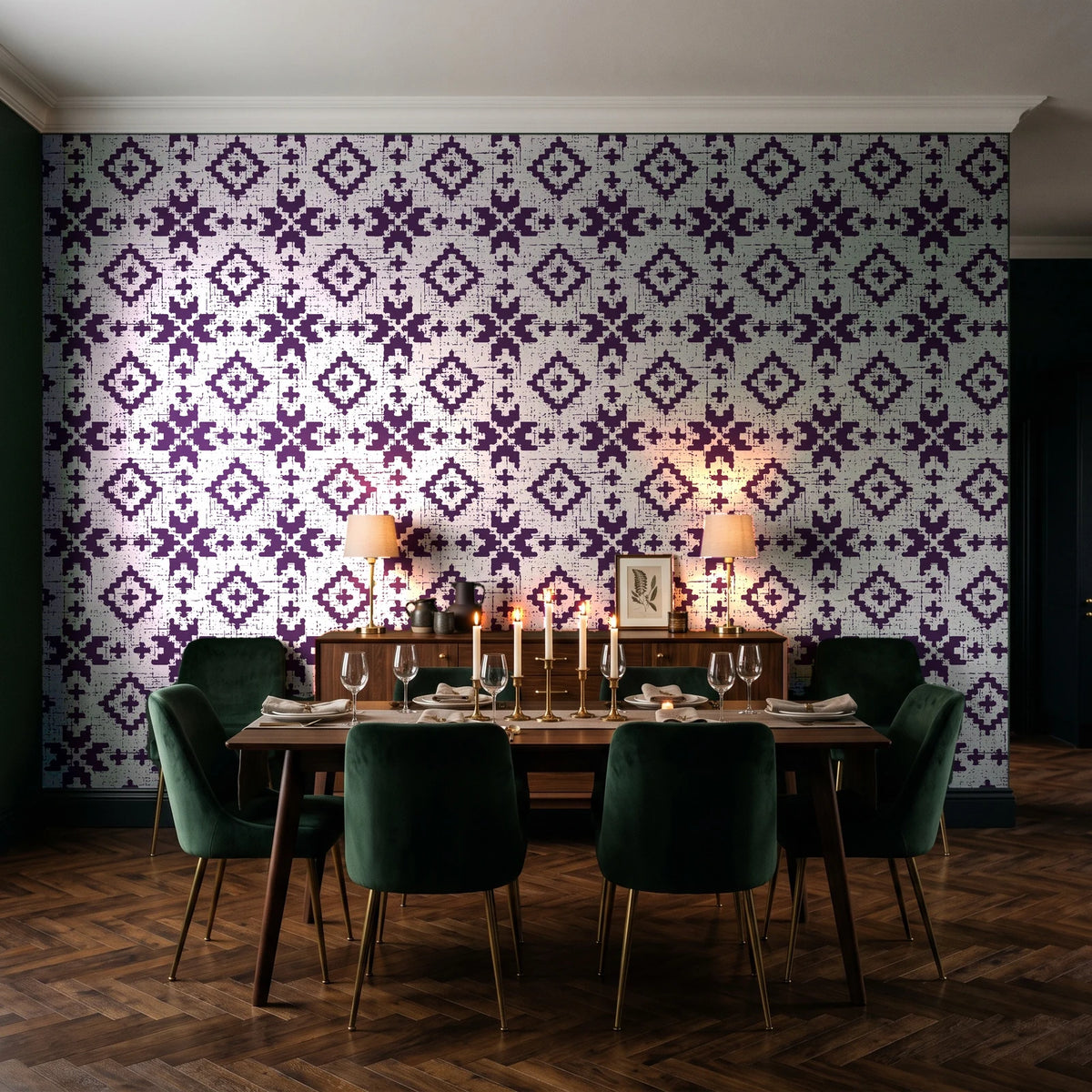 Pale Kilim Plum kilim wallpaper in a dark moody dining room with a candlelit table