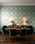 Pale Kilim Sage kilim wallpaper in a dark moody dining room with a candlelit table
