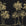 Palm Shade Onyx palm grove wallpaper in black and champagne