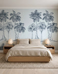Palm Shade Slate palm grove wallpaper behind a low platform bed in a serene Japandi bedroom