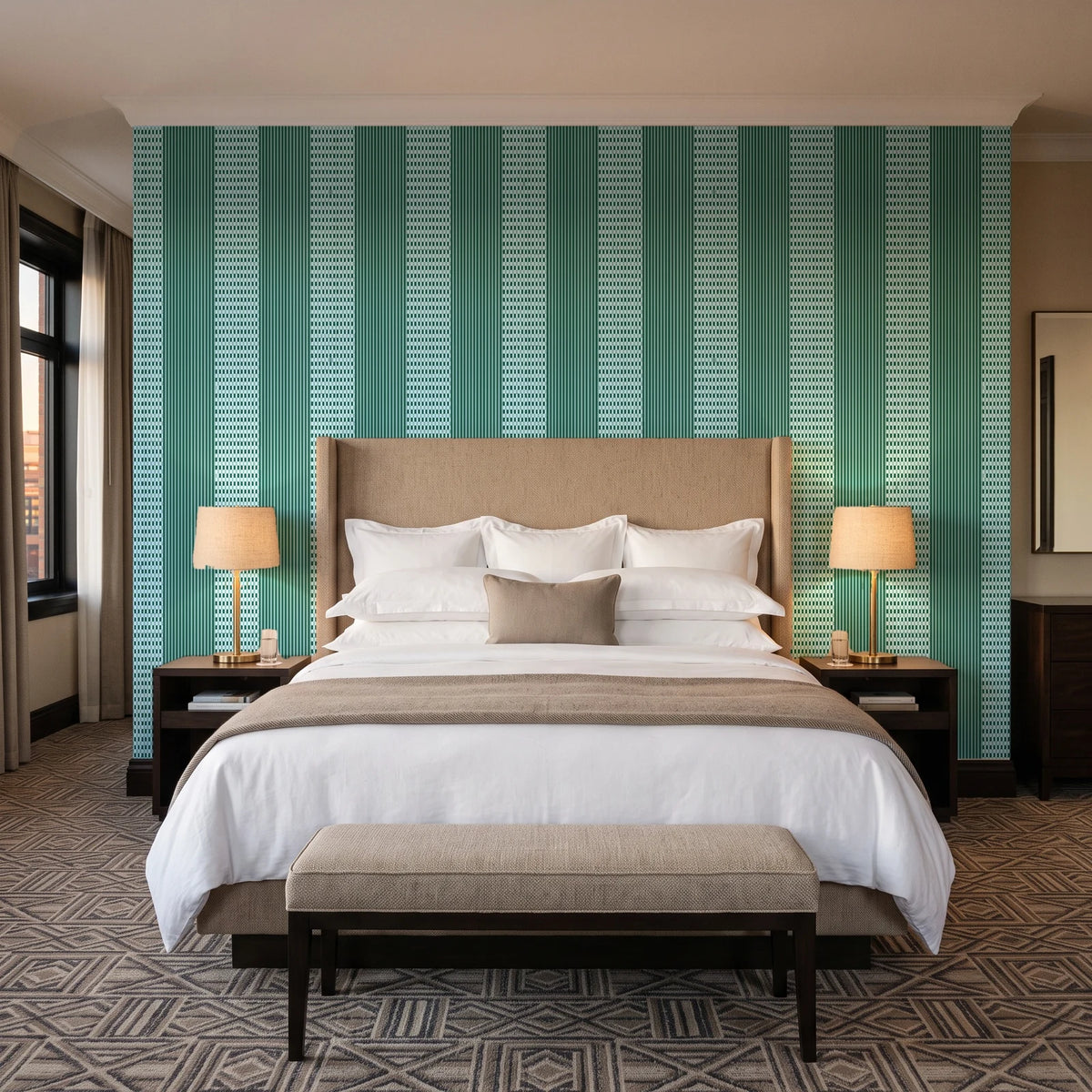 Parlor Stripe Emerald geometric stripe wallpaper behind the headboard of a king bed in a contemporary hotel guest room