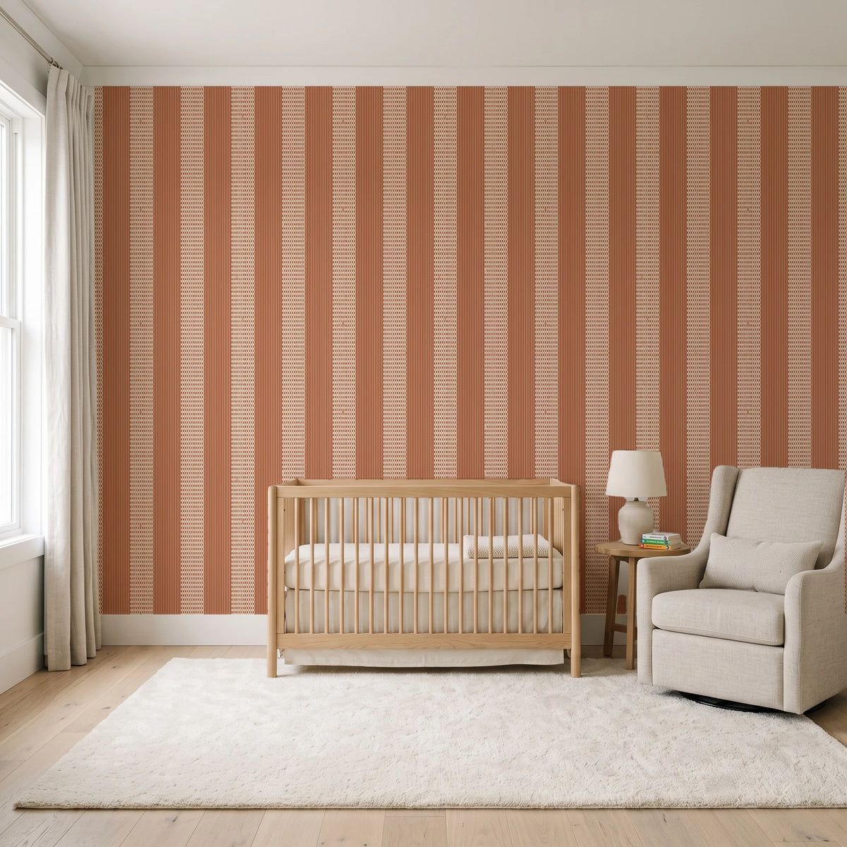Parlor Stripe Terracotta geometric stripe wallpaper in a calm, light-filled nursery