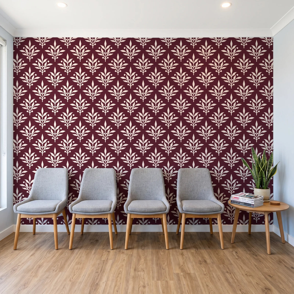 Pastel Bouquet Parade Oxblood botanical damask wallpaper behind a row of upholstered chairs in a bright clinic waiting room