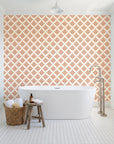 Pastel Bouquet Parade Terracotta botanical damask wallpaper behind a freestanding tub in a bright coastal bathroom