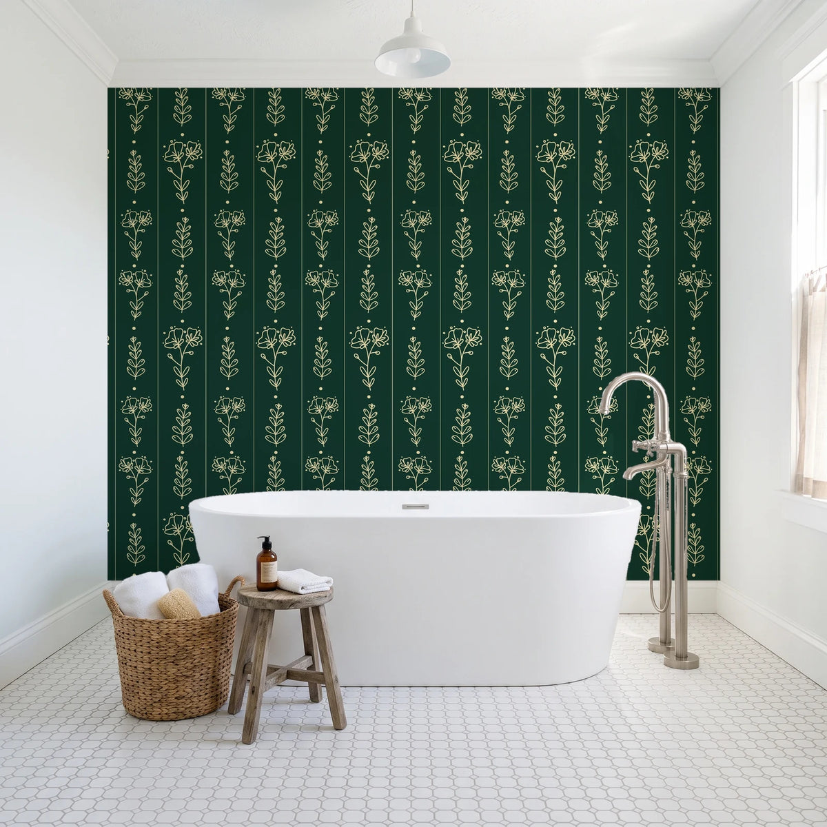 Petal & Thread Emerald botanical stem wallpaper behind a freestanding tub in a bright coastal bathroom
