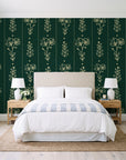 Petal & Thread Emerald botanical stem wallpaper behind a queen bed in a bright coastal bedroom