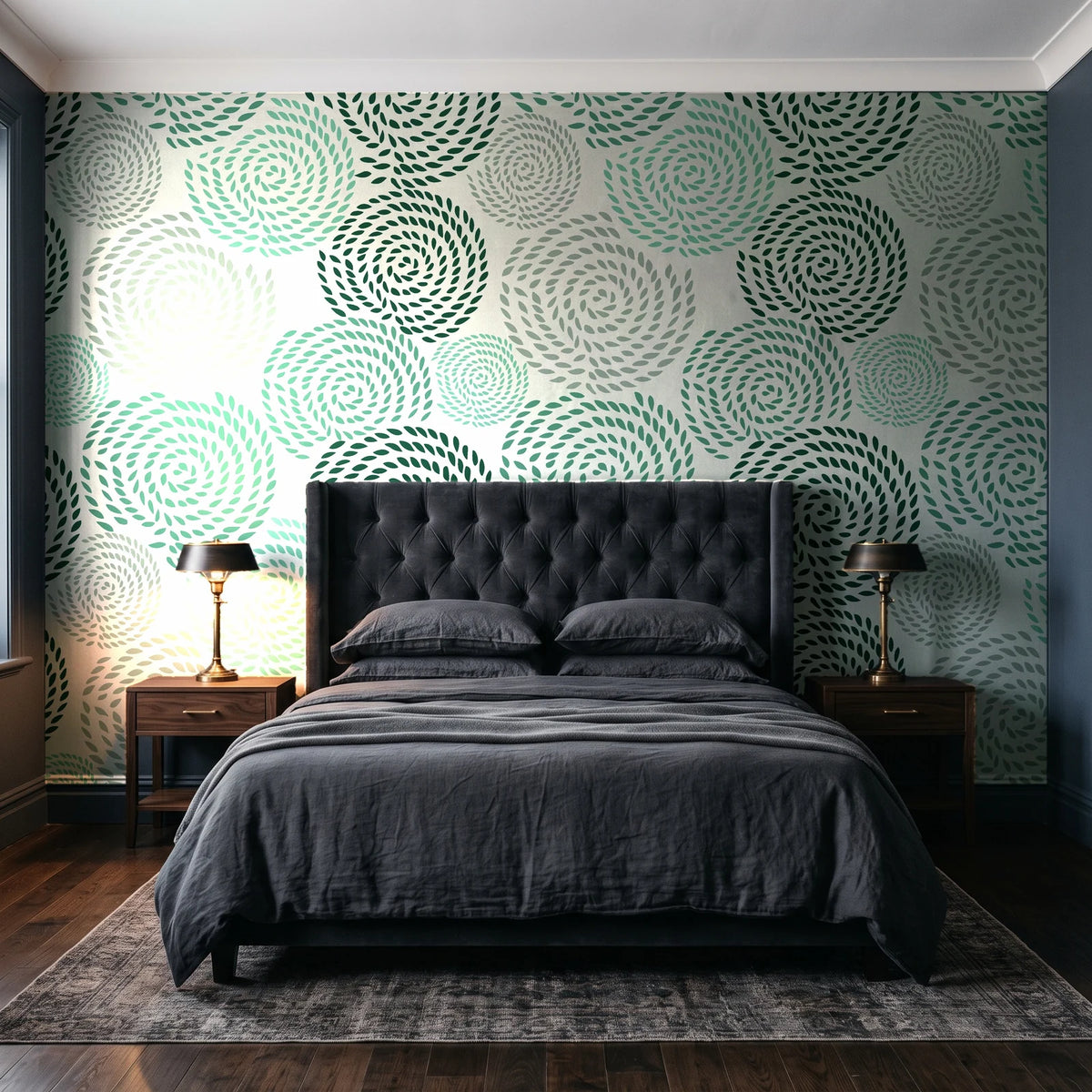 Petal Cascade Emerald spiral rosette wallpaper behind a tufted headboard in a dark, moody bedroom