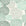 Petal Cascade Emerald spiral rosette wallpaper in emerald and ivory