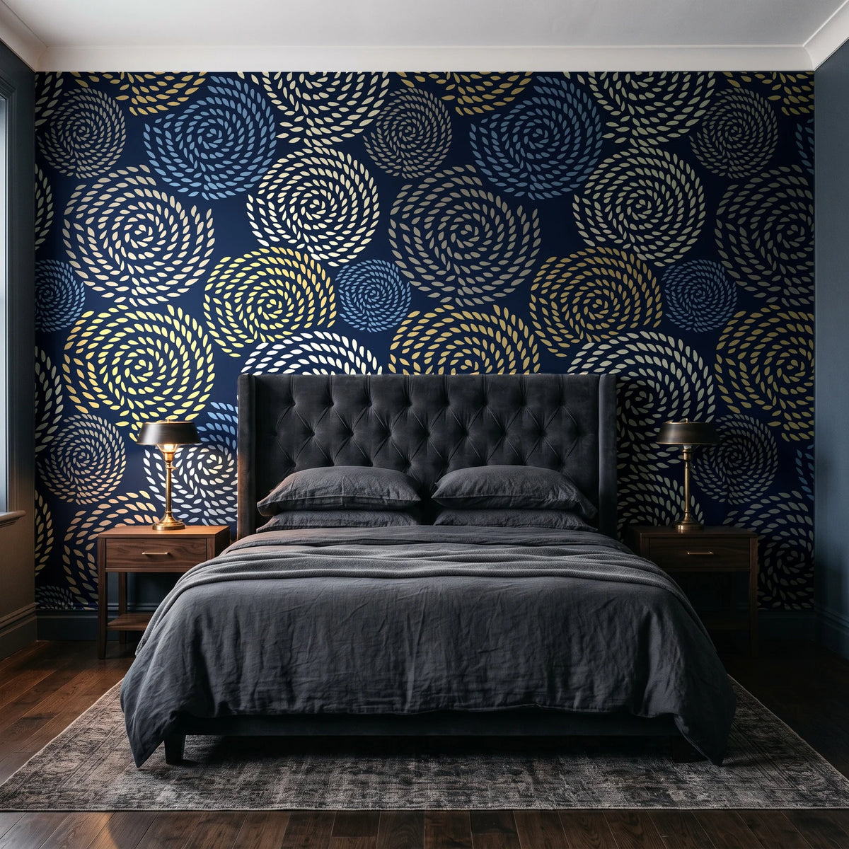 Petal Cascade Midnight spiral rosette wallpaper behind a tufted headboard in a dark, moody bedroom
