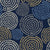 Petal Cascade Midnight spiral rosette wallpaper in midnight and champagne