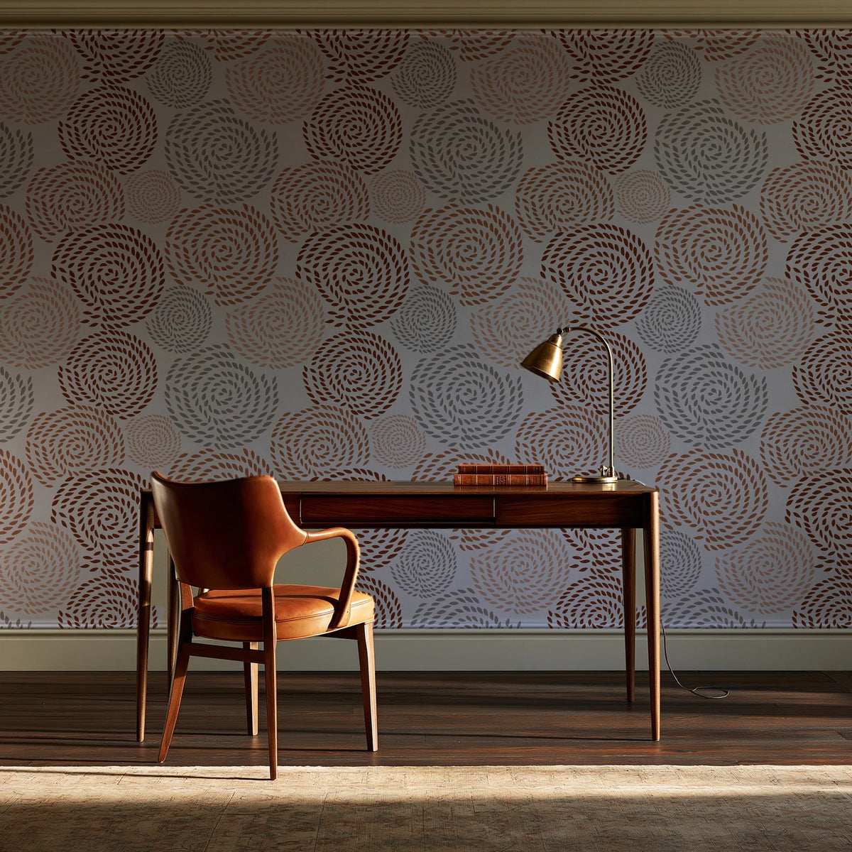 Petal Cascade Terracotta spiral rosette wallpaper as a feature wall in a home study