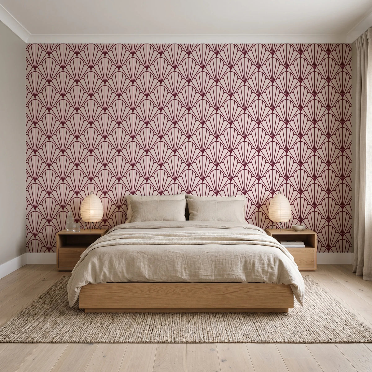 Petal Dawn Oxblood art deco fan wallpaper behind a low platform bed in a serene Japandi bedroom
