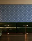 Petal Dawn Slate art deco fan wallpaper in an intimate luxury cocktail lounge