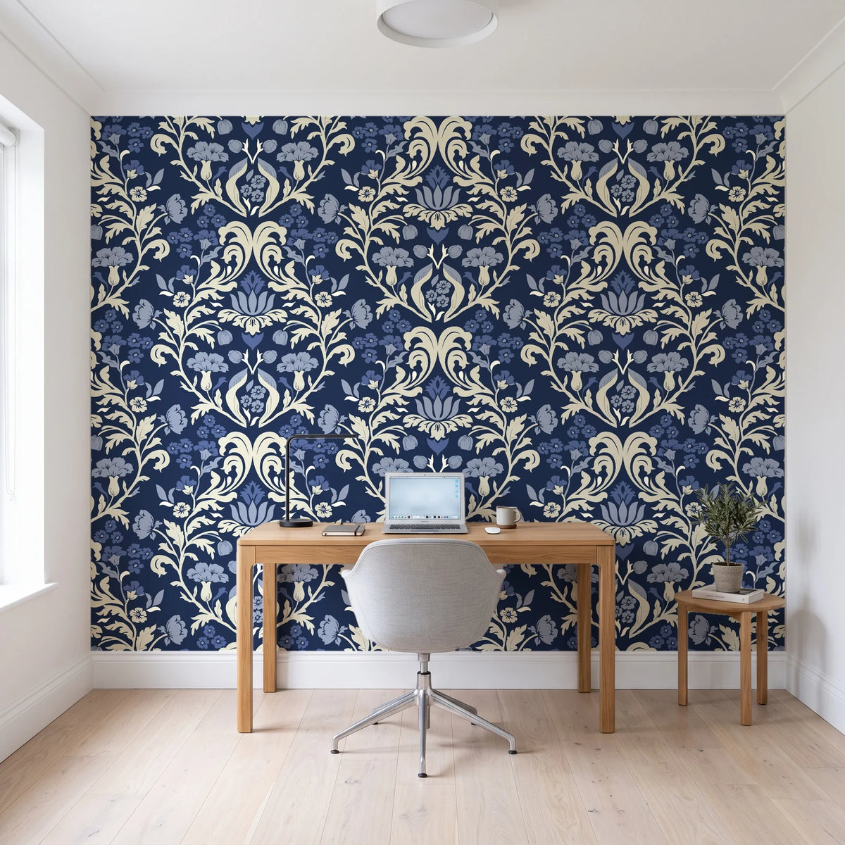 Petal Reflection Midnight floral damask wallpaper behind a modern oak desk in a bright home office