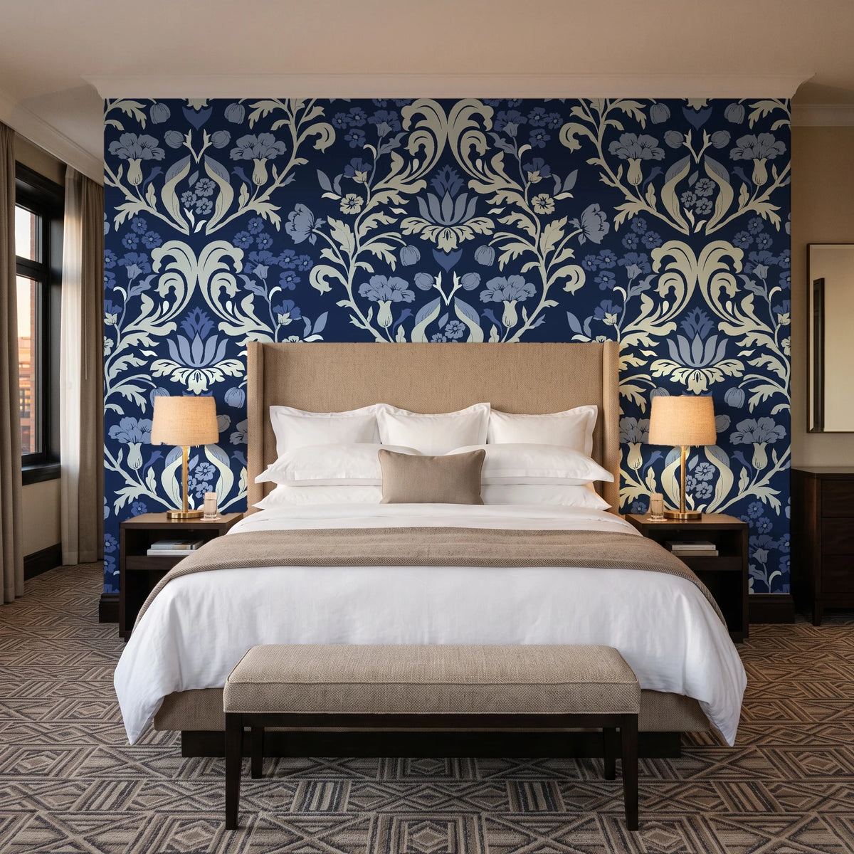 Petal Reflection Midnight floral damask wallpaper behind the headboard of a king bed in a contemporary hotel guest room