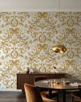 Petal Reflection Ochre floral damask wallpaper in an elegant dining room