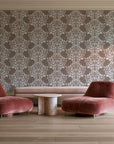 Petal Symphony Mocha baroque damask wallpaper in a boutique hotel sitting area